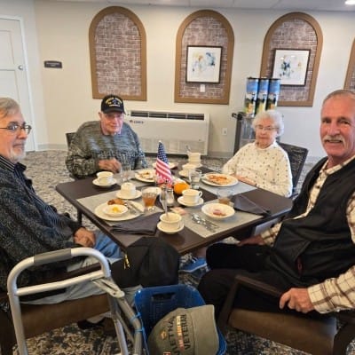 Residents enjoying breakfast in the dining area