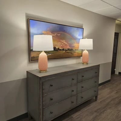 Decorative interior space with lamps and artwork