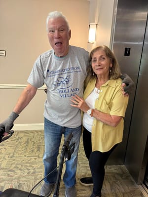 Residents celebrating with smiles in a common area