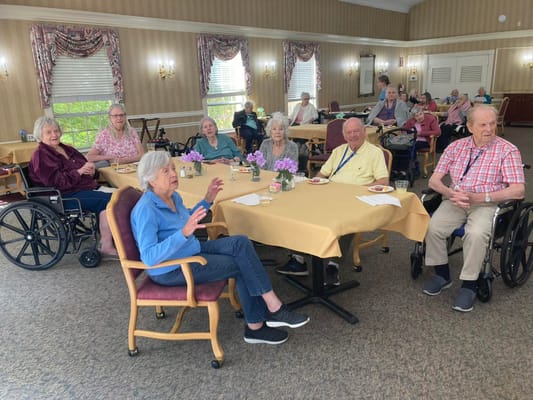 Residents enjoying a meal in the dining room