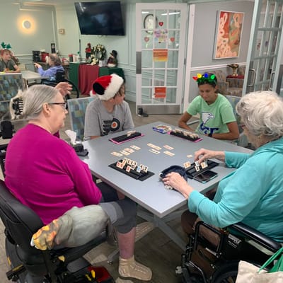 Residents enjoying a game of bingo in a communal area