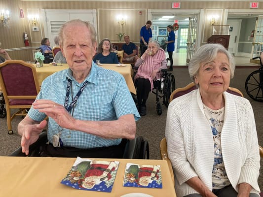 Residents enjoying time together in the dining area