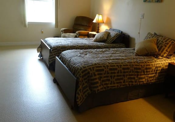 Interior view of a shared resident room with two beds
