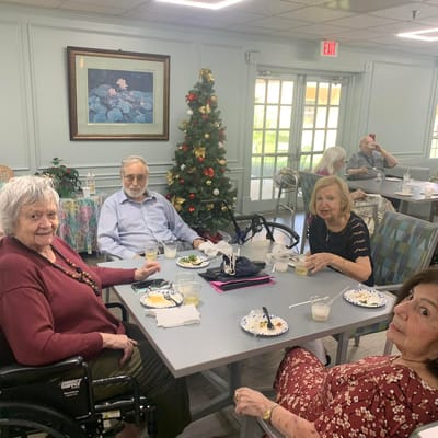 Residents enjoying a meal in the dining room
