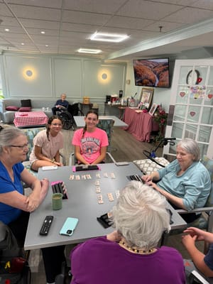 Residents enjoying a game in a common area