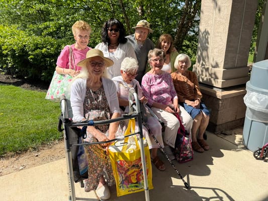 Residents enjoying time outdoors in a community setting