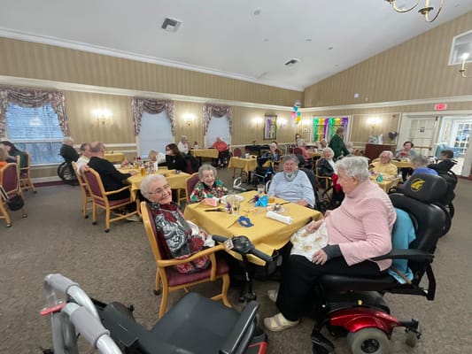 Residents enjoying a meal in the dining area