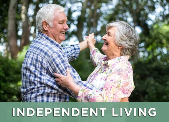 Couple dancing outdoors in a lush garden setting