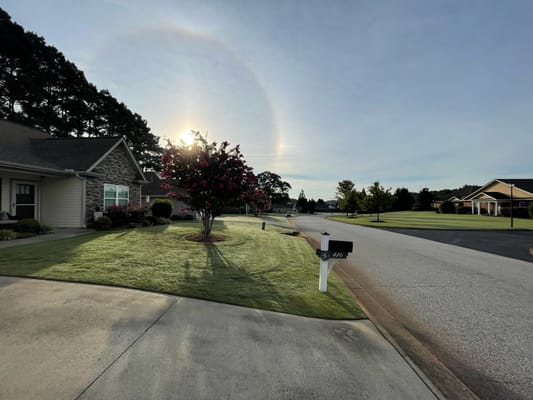 Sunrise over a landscaped outdoor area