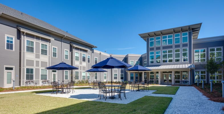 Outdoor courtyard with seating and umbrellas