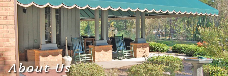 Covered outdoor seating area with rocking chairs