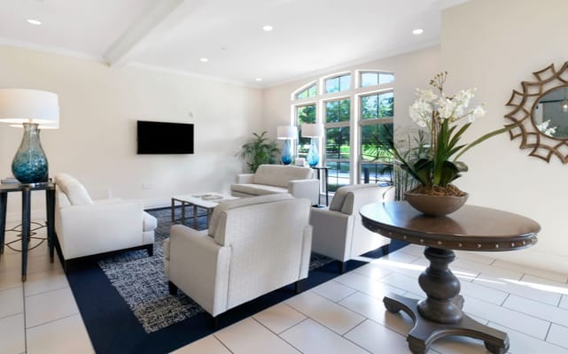 Bright common area with seating and decor