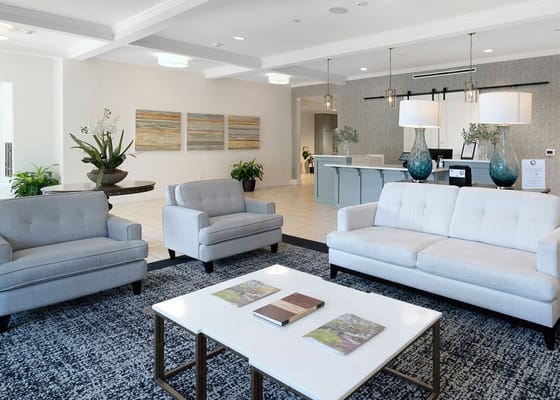 Bright common area with seating and decor