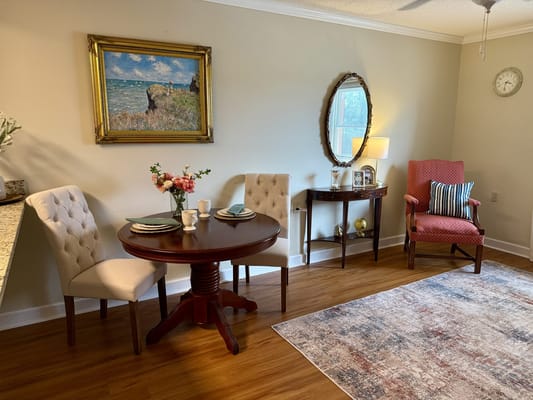 Cozy common area with seating and decor.