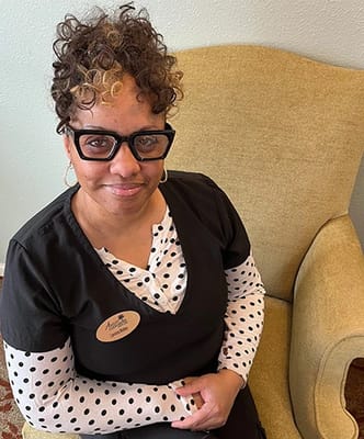 Staff member in a resident room