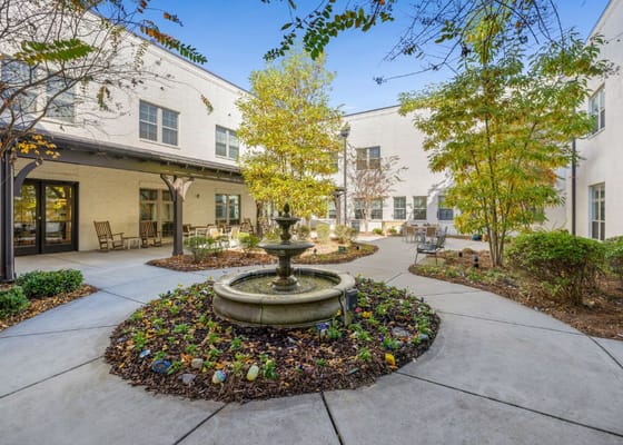 Beautiful courtyard with a fountain and landscaping