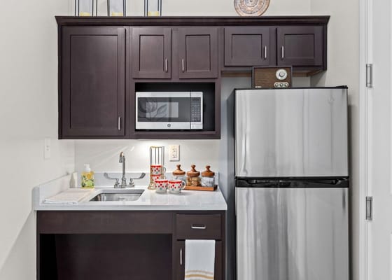 Kitchen area with appliances and decor