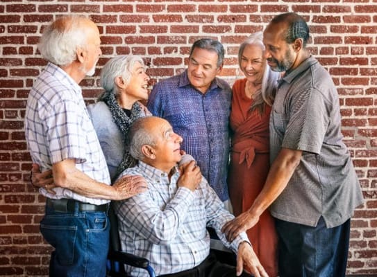 Residents engaging joyfully in a social setting