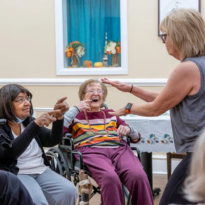 Residents engaging in an activity session in a common area