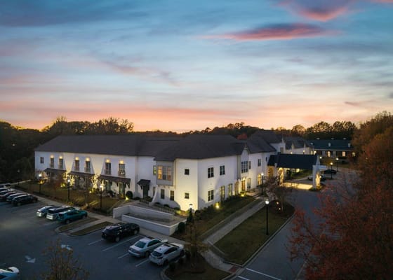 Aerial view of the facility at sunset