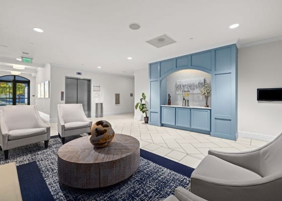 Bright and welcoming interior common area with seating