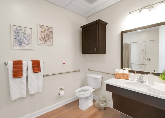 Well-lit bathroom with modern fixtures and decor