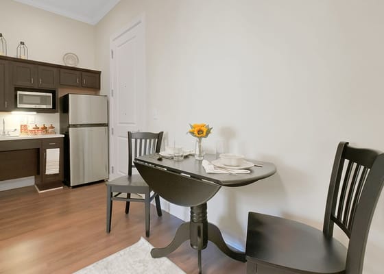 Bright dining area with a table and chairs