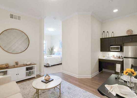 Bright interior of a private resident room with amenities