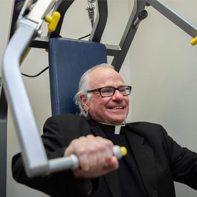 A man exercising on a gym machine