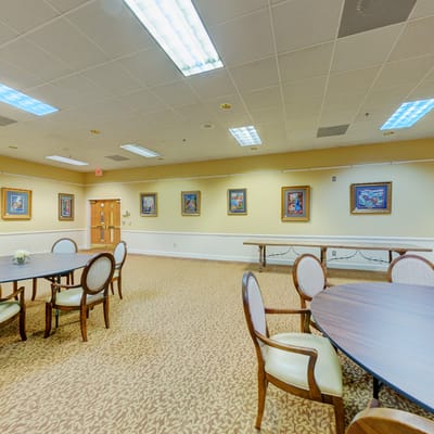 Interior view of a common area with tables and chairs