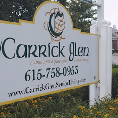 Signage displaying Carrick Glen's name and contact information
