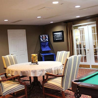 Indoor game area with seating and pool table