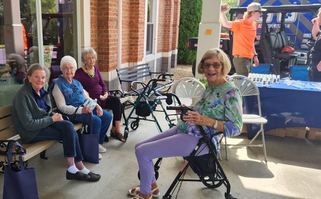 Residents enjoying time outdoors with refreshments