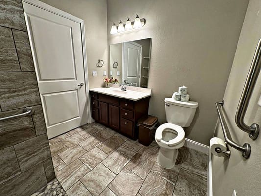 Interior view of a private bathroom in a senior living facility