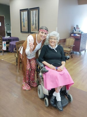 Staff member with a resident in a common area
