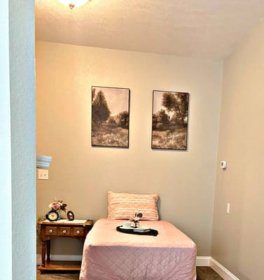 Cozy private room with decor and a snack tray