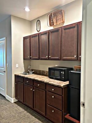 Bright and clean kitchenette area with appliances