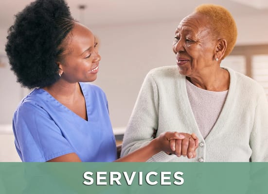 A caregiver holding hands with a senior resident