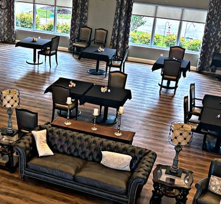 Interior dining area with tables and chairs arranged