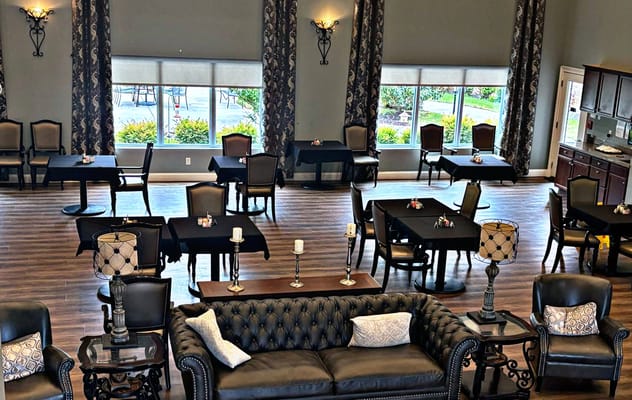 Interior view of a dining room with tables and seating