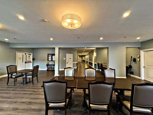 Interior view of a common area with tables and chairs
