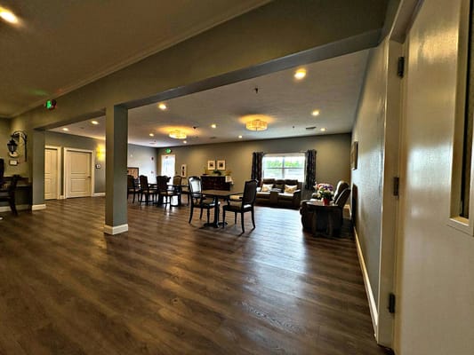 Interior common area with seating and tables.