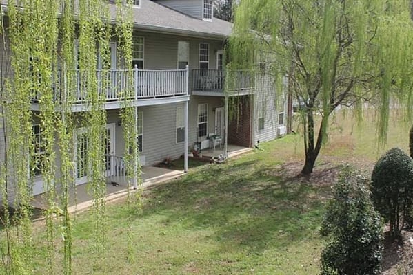 Outdoor view of the facility with green landscaping