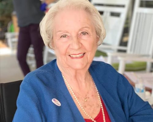 Portrait of a smiling resident in a common area