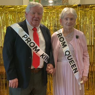 Residents dressed for prom with sashes