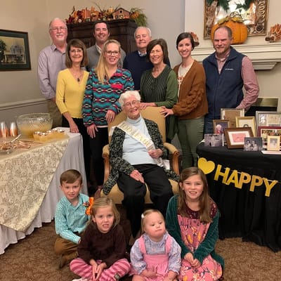 Residents and staff celebrating a milestone together