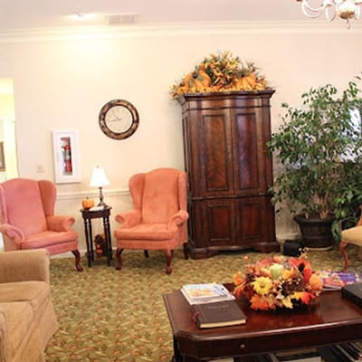 Cozy common area with armchairs and fall decorations