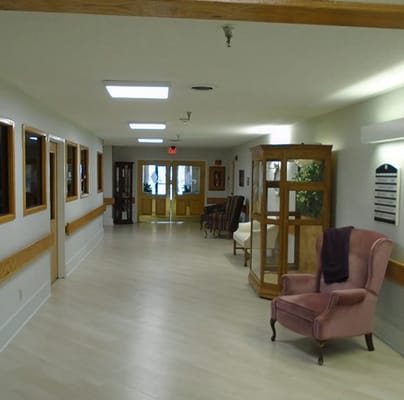 Warm and inviting corridor with seating