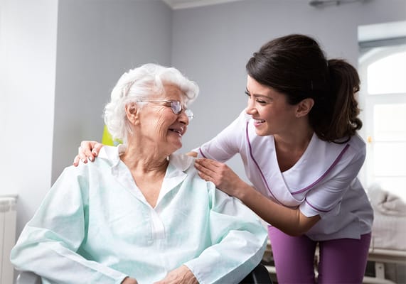 Staff member interacting with a resident