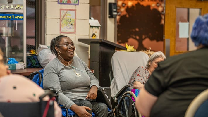 Residents enjoying a group activity in a common area